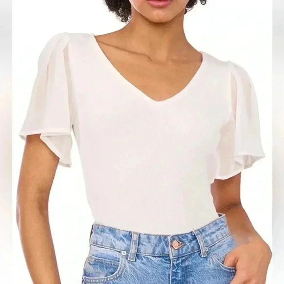 1. STATE
V-Neck Chiffon Short Flutter Sleeve Ribbed Knit Top Size Med light pink - Picture 2 of 4